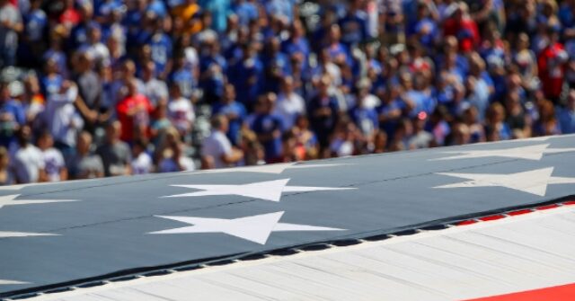 Man Gets Stuck on Giant American Flag at Jets-Steelers Game